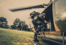 Under 40 Minutes: Bin Laden Raid Math Soldier boarding a helicopter during field operation