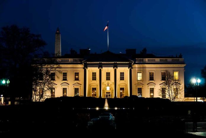 shutterstock_1023529654 The White House illuminated at night