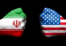 Oil Chokepoint Sparks U.S. – Iran Standoff Fists painted as Iran and United States flags facing each other