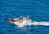 Lethal Maritime Shift – Oversight Goes Dark coast guard patrol boat speeding across open ocean