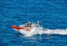 Lethal Maritime Shift – Oversight Goes Dark coast guard patrol boat speeding across open ocean