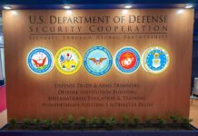 Military’s New Testosterone Rule Sparks Doctor Uproar U.S. Department of Defense display wall with service seals