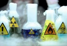 AI Lowers Biohazard Barriers — Alarms Ring laboratory flasks with hazard symbols and colorful liquids