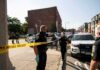 Campaign Bombshell: Tearful Arrest Video Drops Police officers secure an urban street with yellow tape near patrol cars