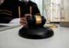 Supreme Smackdown: Trump Torches His Own Picks Judge's gavel on a desk with scales of justice in background