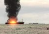 Blockade Drama: Tanker Stopped Cold Cargo ship on fire with thick black smoke at sea