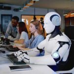 Robot and office workers at computers in a modern workspace