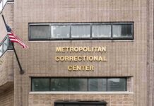 DOJ Pushes Hard Stop On Prison Trans Care Metropolitan Correctional Center entrance with American flag
