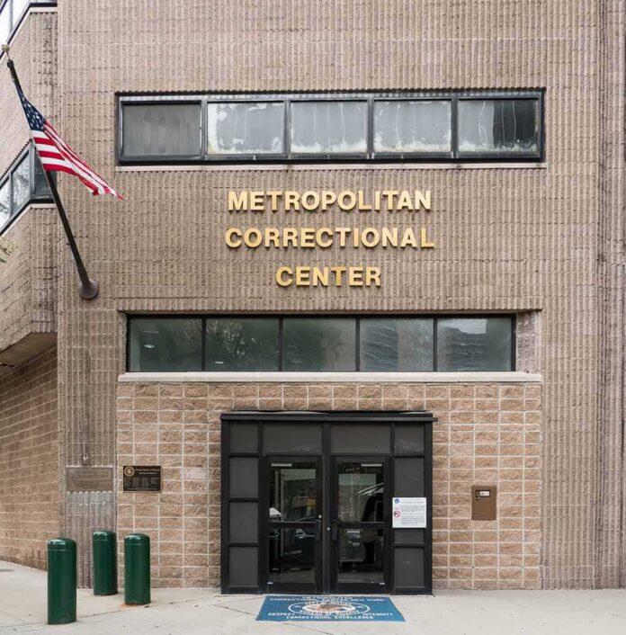 shutterstock_717683740 Metropolitan Correctional Center entrance with American flag