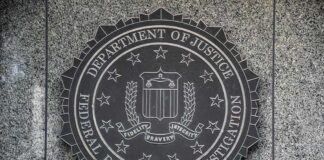 FBI seal mounted on a granite wall