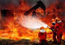 Eagle’s Nest IN FLAMES – What Sparked It? Firefighters battling a large industrial blaze
