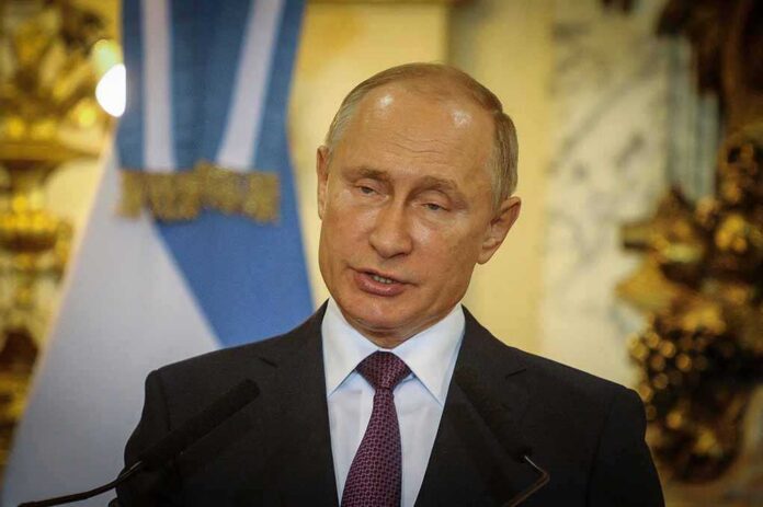 Buenos,Aires,,Argentina,-,Dec,02,,2018:,Russia's,President,Vladimir Vladimir Putin speaking at a podium with microphones