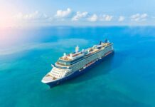 Dream Cruise Evicts Residents In Cambodia Cruise ship sailing on calm turquoise sea