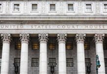 Freed 13 Years – Now Back to Prison? United States courthouse facade with Corinthian columns
