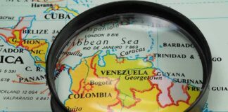 Magnifying glass over a map of northern South America