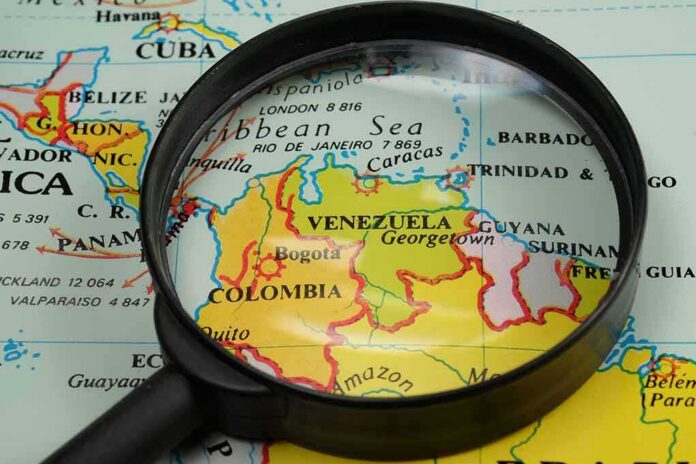 shutterstock_435064315-1 Magnifying glass over a map of northern South America