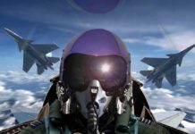One-Leg Pilot Back In Combat Cockpit fighter pilot in cockpit with two jets flying in formation