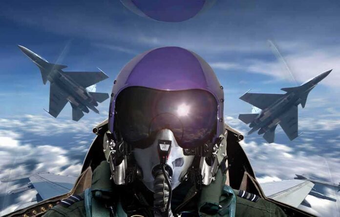 shutterstock_727299742 fighter pilot in cockpit with two jets flying in formation