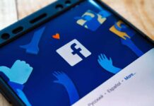 Mayor’s Spanish Video Ignites ICE Firestorm Smartphone screen showing Facebook app logo and icons